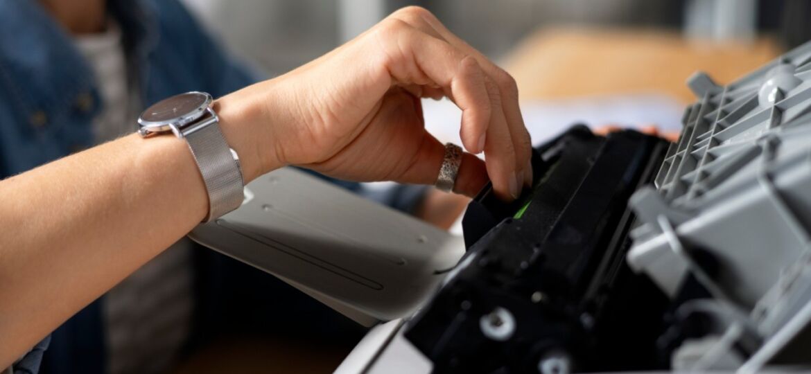 side-view-worker-using-printer (1) (1) (1) (1) (1)